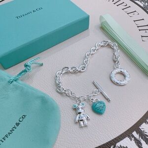 Tiffany & Co. Silver Bracelet with Blue Charms